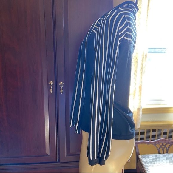 Adorable and soft knit top with striped tie and striped sleeves. Classic look. - Picture 4 of 6